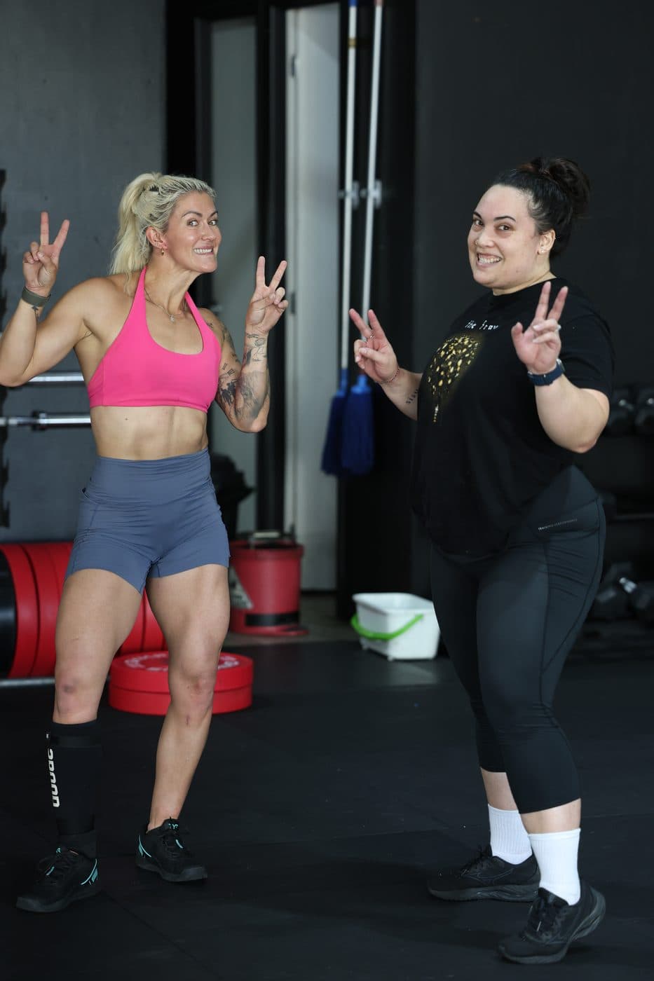 Two KVZ members having a laugh in the gym