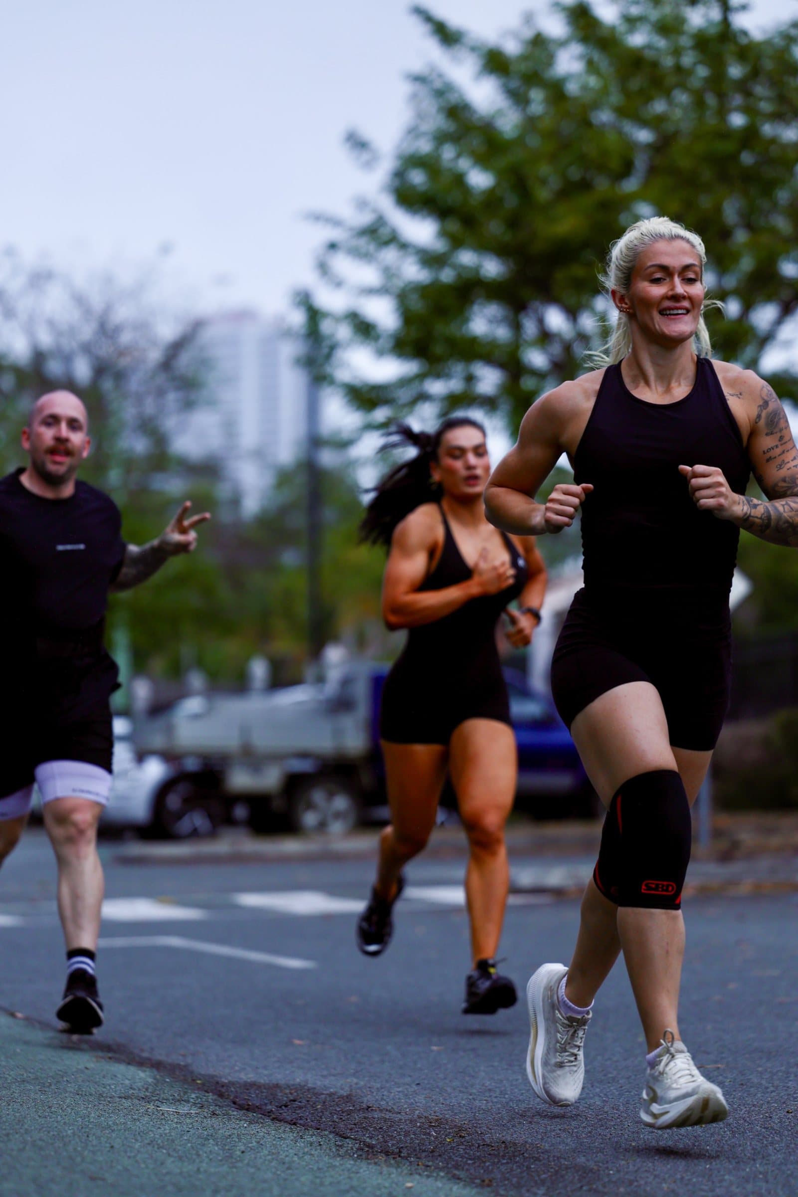 Katelin Van Zyl running with two KVZ members
