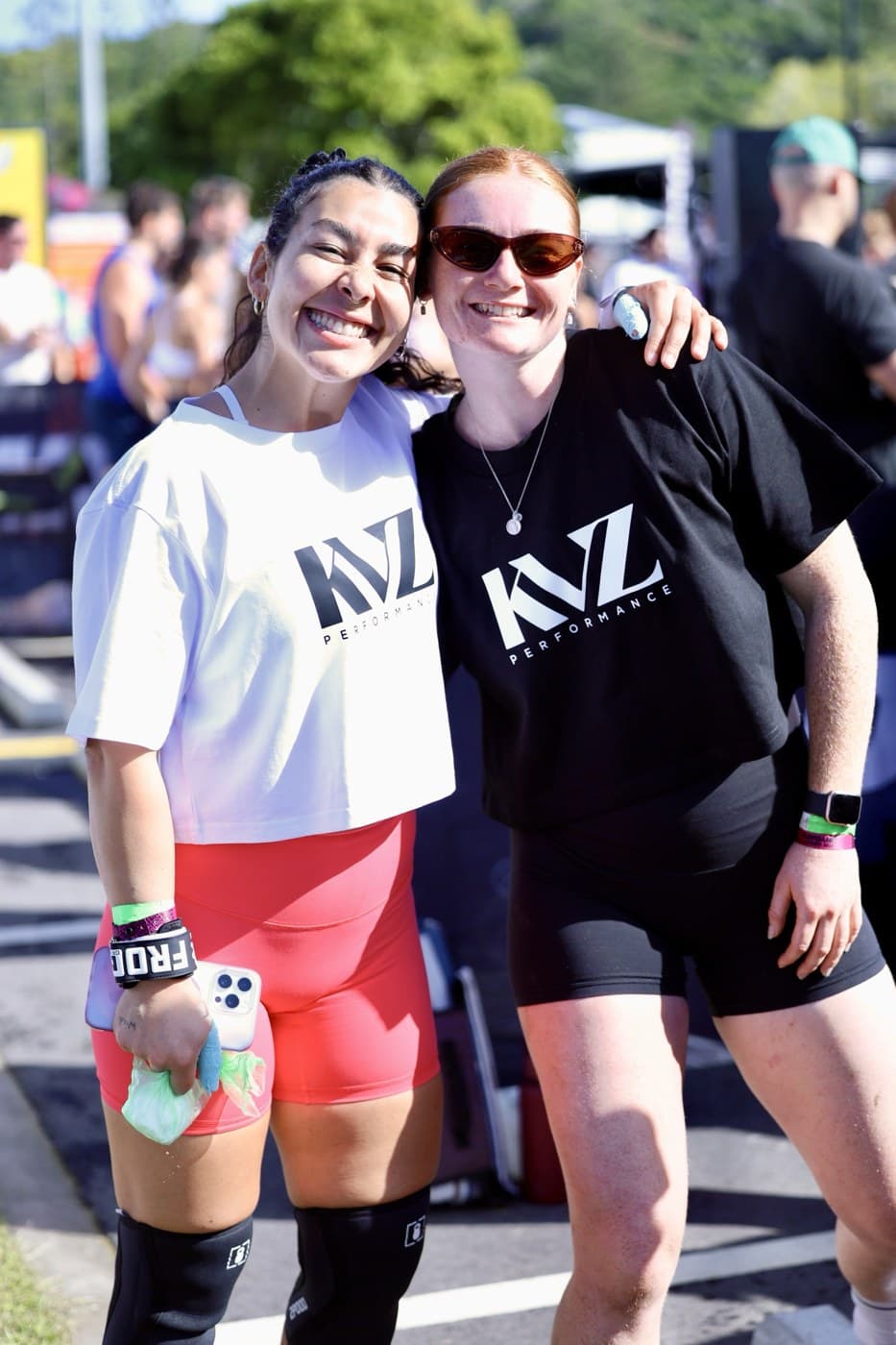 Two KVZ members in KVZ tees